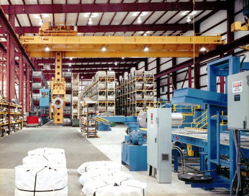 Telescoping Rotating Mast Stacker for Coil
