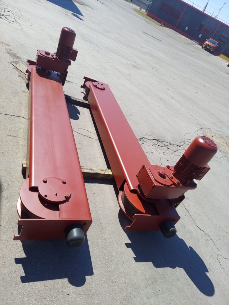 Single girder crane assembly with end trucks and drive motors ready for shipping Single girder crane assembly with end trucks and drive motors ready for shipping